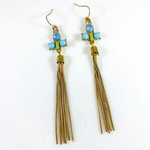 beautiful baby blue cabochon stones set in gold-tone setting with chain tassels